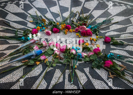 The Imagine mosaic with flowers on John Lennon death anniversary at Strawberry Fields in Central Park, Manhattan - New York, USA Stock Photo