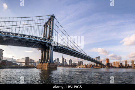 Manhattan Bridge and Manhattan Skyline seen from Dumbo in Brooklyn - New York, USA Stock Photo