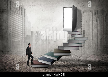 Asian business man step up the stair. Business promotion concept Stock Photo