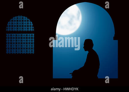 Image of silhouette man praying with mosque background Stock Photo - Alamy