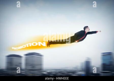 Business man flying with promotion shadow behind him. Job promotion concept Stock Photo