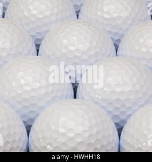 White golf balls in the open box Stock Photo