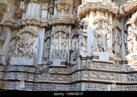 Deity sculpture under eves on shrine outer wall in the Chennakesava Temple, Hoysala Architecture, Somanathpur, Karnataka, India Stock Photo