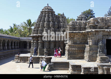 Side view façade, showcasing stellate design towers, ornamented, detailed stone carvings, at Chennakesava Temple, Hoysala Architecture, Somanathpur, K Stock Photo