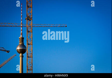 The TV tower seen through a construction site in Berlin, Germany. Stock Photo