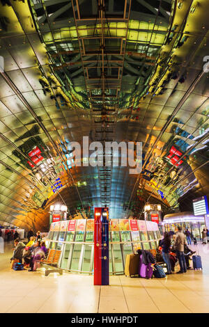 Frankfurt Main, Germany - March 15, 2017: Frankfurt Airport long-distance station with unidentified people at night. The modern building was designed  Stock Photo