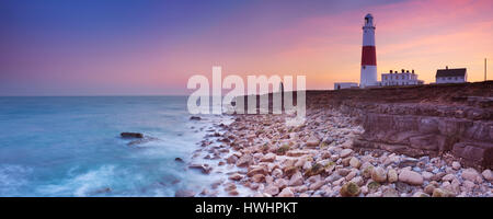 The Portland Bill Lighthouse on the Isle of Portland in Dorset, England at sunset. Stock Photo