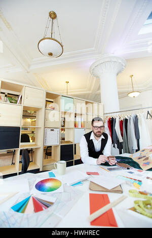 young clothes designer in her studio Stock Photo - Alamy