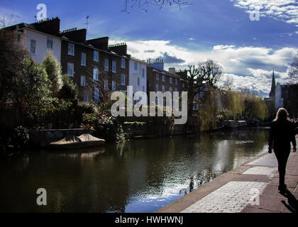 Regents canal  tow path pedestrian walking away Stock Photo