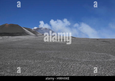 View of crater summit, snow, lava, smoke, magma and molten rocks. March 2017 eruption on Mount Etna in Sicily, southern Italy, the largest active volc Stock Photo