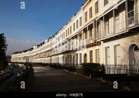 Facades of houses on Royal York Cresent in the Clifton district of Bristol, England. Houses on the Georgian terrace have wrought iron balconies. Stock Photo