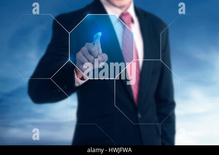 Businessman push button the screen, the inovation of technology success concept Stock Photo