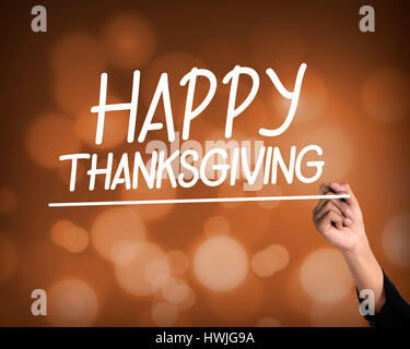 Happy Thanksgiving hand writing virtual screen text on abstract background Stock Photo