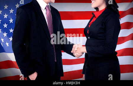 Business man and woman hand shake with USA flag on the background. Business in USA conceptual Stock Photo