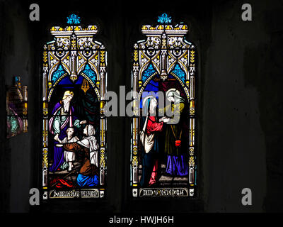 Stained glass  memorial windows of 1856 in St Swithun-upon-Kingsgate church, Winchester commemorating Isabella Jane Walford. Stock Photo