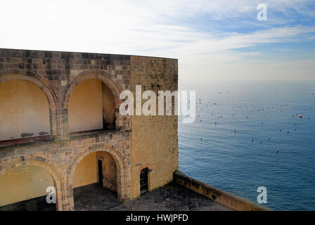 Naples, Italy.View of the sea from the ramparts of the Castel dell' Ovo.  Castel dell'Ovo is a seaside castle in Naples, located on the former island of Megaride, now a peninsula, on the Gulf of Naples. Stock Photo
