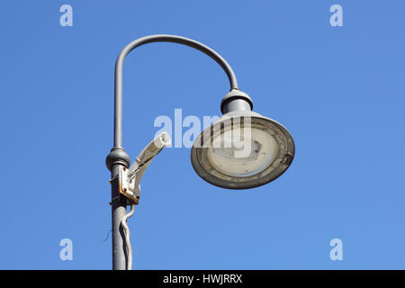 Support for broken security camera on light pole Stock Photo