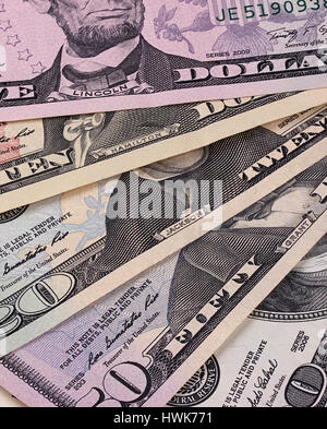 American dollar bills of different denominations abstract background. Stock Photo