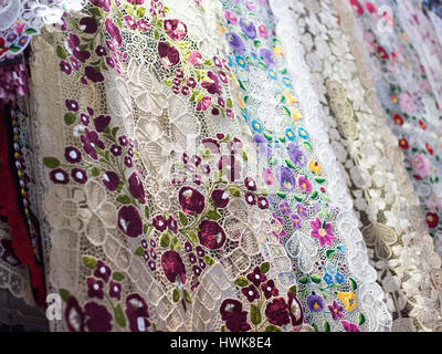 Multicolored lace tablecloths Stock Photo