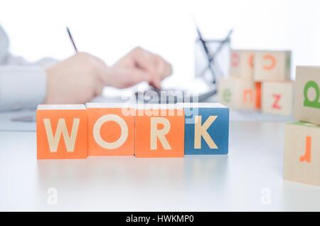 WORK word with colorful blocks. work job business leadership word cube block man concept Stock Photo