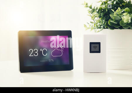 Weather station with LCD display. weather station home equipment digital clouds display climate concept Stock Photo