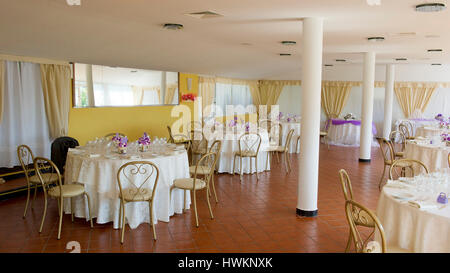 Table furnished inside a restaurant Stock Photo