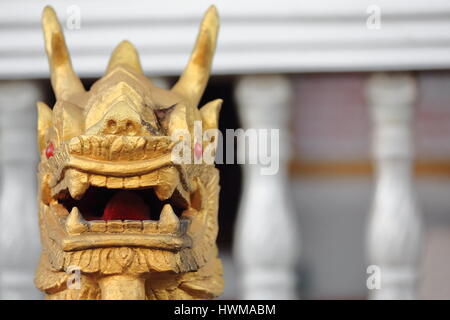 Rajasinha head-front gate Wat Pha Singkham temple by the Nam Phak river. Modern building home to a 400 year old Buddha statue believed to be able to m Stock Photo