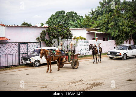 Trinidad, Cuba - January 14, 2016: Trinidad's residents still use horse-drawn carriages as the preferred vehicle. Cuba has one of lowest vehicle per c Stock Photo