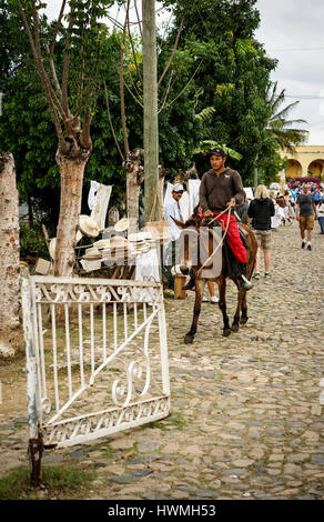 Trinidad, Cuba - January 14, 2016: Trinidad's residents still use horses for transportation. Cuba has one of lowest vehicle per capita rates in the wo Stock Photo