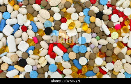 various colors pills texture background drugs pattern Stock Photo