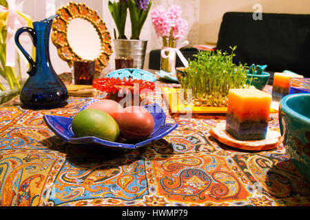 Haft Seen traditional table of Nowruz. A 'Haft Seen' setting in Tehran, Iran. Haft-Seen also spelled as Haft Sin (Persian: هفتسین, the seven seen's Stock Photo