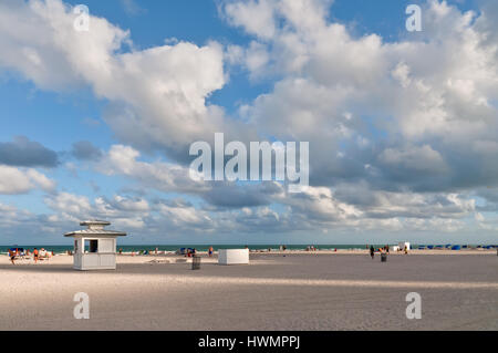 Miami Beach, USA - November 26, 2011. People enjoy their free time on beach in the city of Miami Beach. South Beach are popular destinations for both  Stock Photo