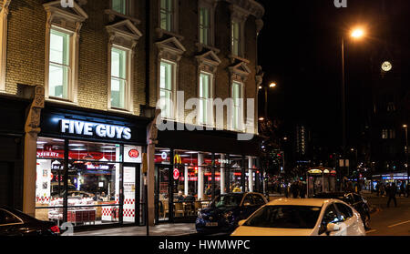 Five Guys restaurant at 295-297 The Kings Cross Lighthouse Block, Pentonville Road, Kings Cross, Central London, England, NC 1, UK. Stock Photo