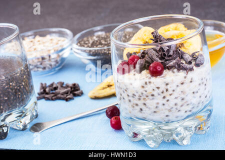 Oatmeal with chia seeds, cranberries and chocolate Stock Photo