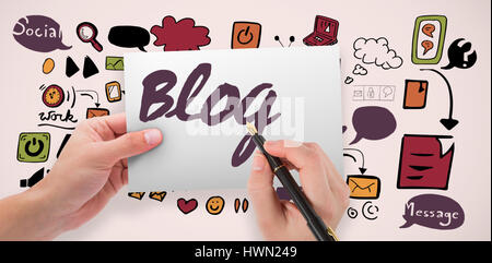 Hands holding card and pen against neutral background Stock Photo