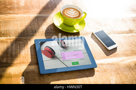 Close-up of login page against cup of coffee and tablet pc Stock Photo