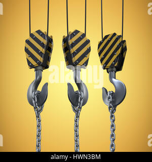 Studio Shoot of a crane lifting hook against yellow vignette Stock Photo