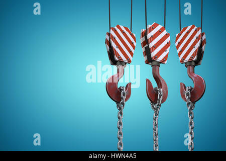 Studio Shoot of a crane lifting hook against blue vignette background Stock Photo