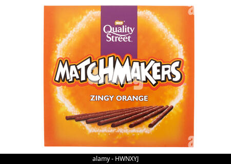 Box of Quality Street zingy orange Matchmakers on white background Stock Photo