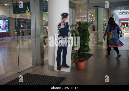 14.02.2017, Singapore, Republic of Singapore, Asia - A warning sign made of cardboard is seen in front of a shopping mall. Stock Photo