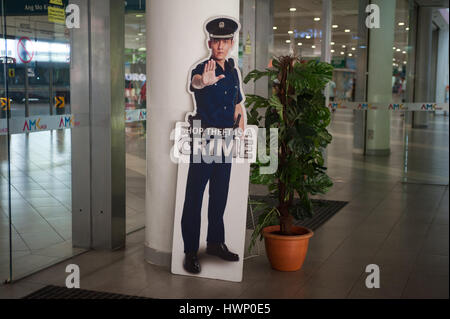 14.02.2017, Singapore, Republic of Singapore, Asia - A warning sign made of cardboard is seen in front of a shopping mall. Stock Photo