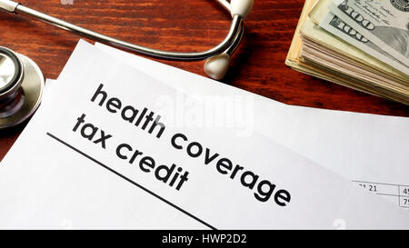 Document with title health coverage tax credit. Stock Photo