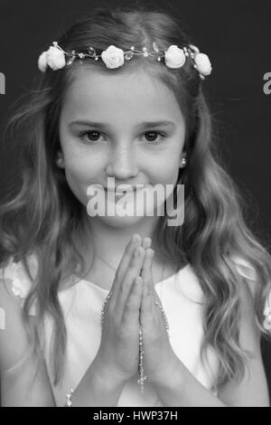 Portrait of a girl on her first holy communion day Stock Photo