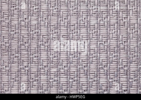 Light gray knitted woolen background with a pattern of soft, fleecy cloth. Texture of silver textile closeup. Stock Photo
