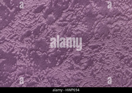 Light purple background from a soft upholstery textile material, closeup. Fabric with natural texture. Cloth backdrop. Stock Photo