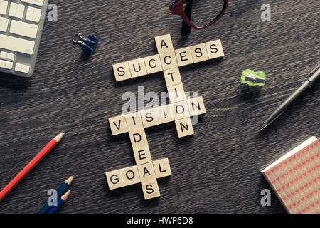 Success achieving business keywords collected of wooden cubes in Stock Photo