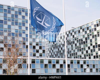 The Hague, Netherlands - March 27, 2016: The flag and the International Criminal Court at the new 2015 opened ICC building. Stock Photo