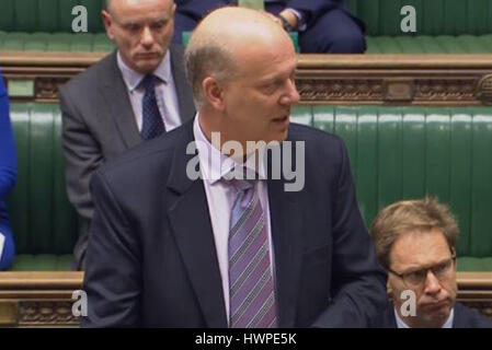 Transport Secretary Chris Grayling answers a question on aviation security in the House of Commons, London, following the decision to ban UK-bound airline passengers from taking laptops onboard flights from six countries. Stock Photo
