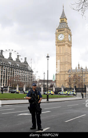 NOTE ALTERNATE CROP Police outside the Palace of Westminster, London, after sounds similar to gunfire have been heard close to the Palace of Westminster. A man with a knife has been seen within the confines of the Palace, eyewitnesses said. Stock Photo