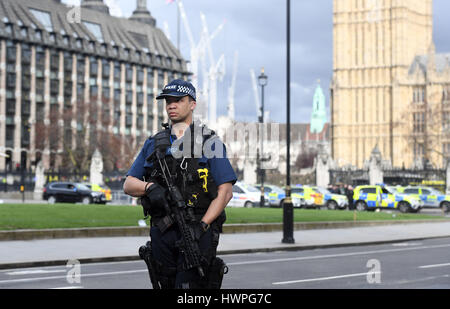 Police close to the Palace of Westminster, London, after policeman has been stabbed and his apparent attacker shot by officers in a major security incident at the Houses of Parliament.